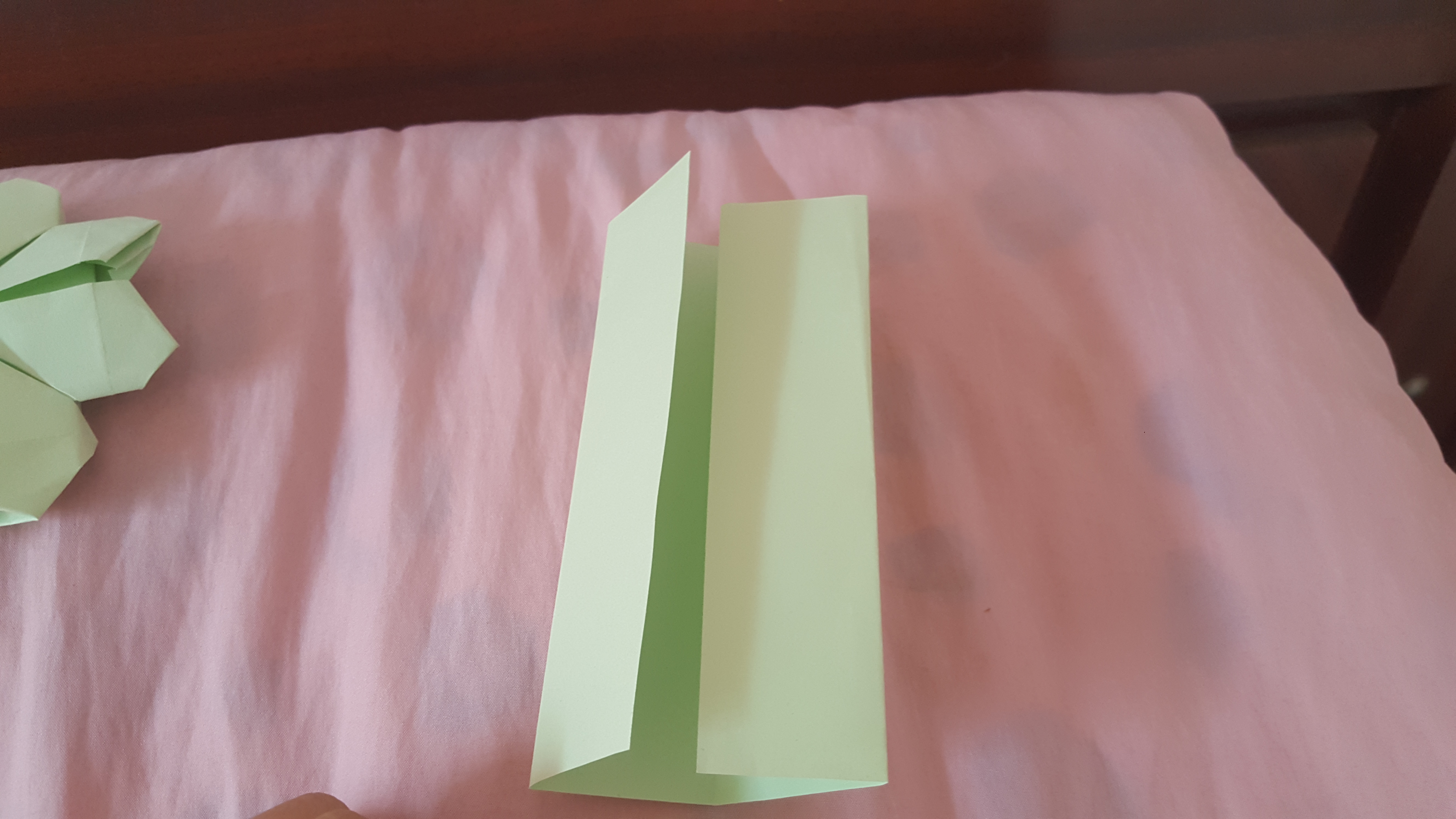 兩邊再次向里對折